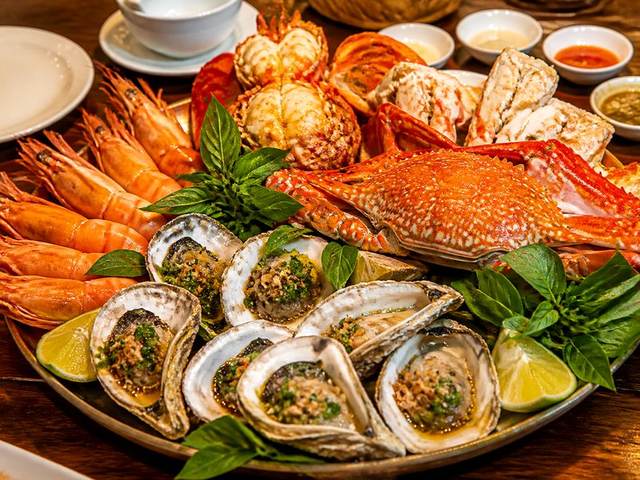 Ốc mỡ hấp cay